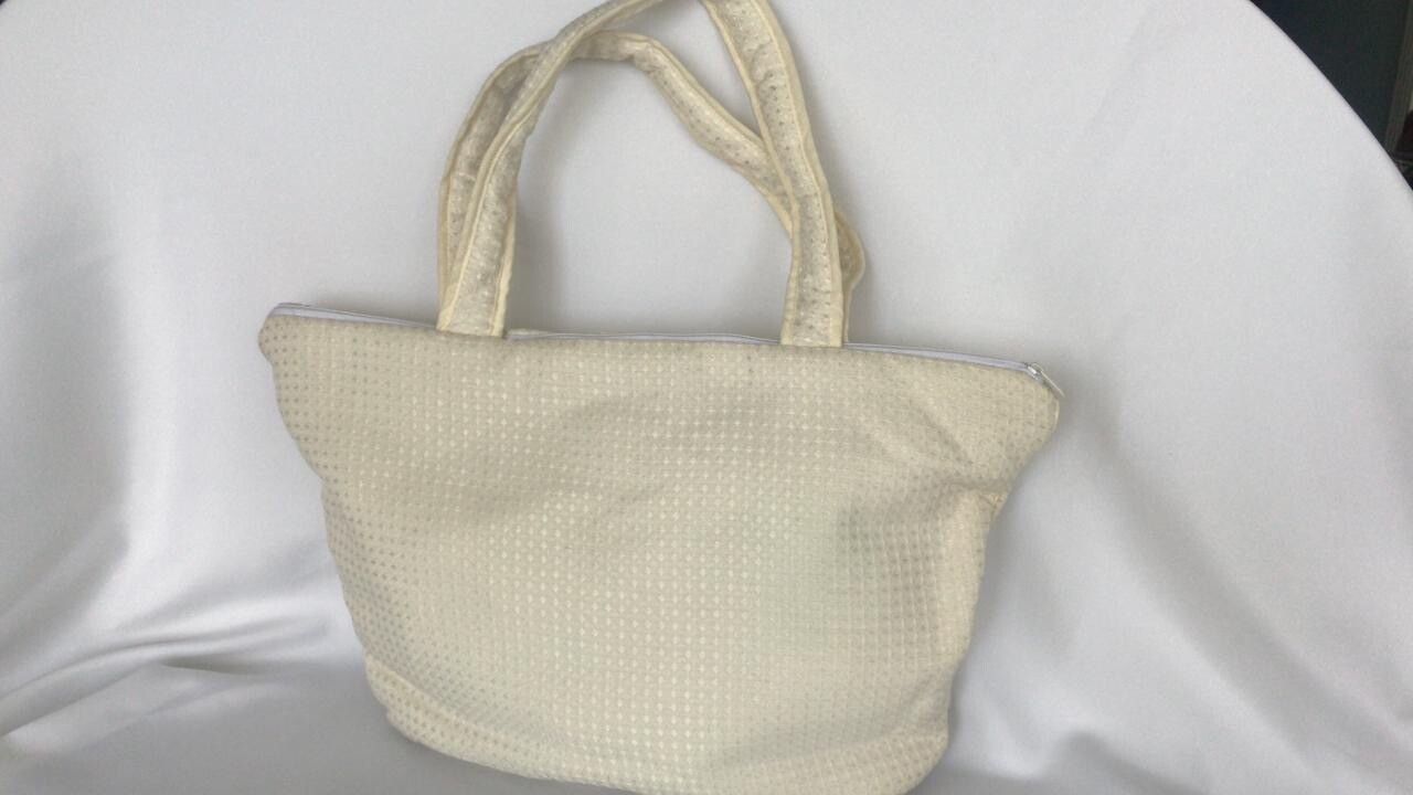 BOLSO EN TELA PIQUE COLOR BEIGE