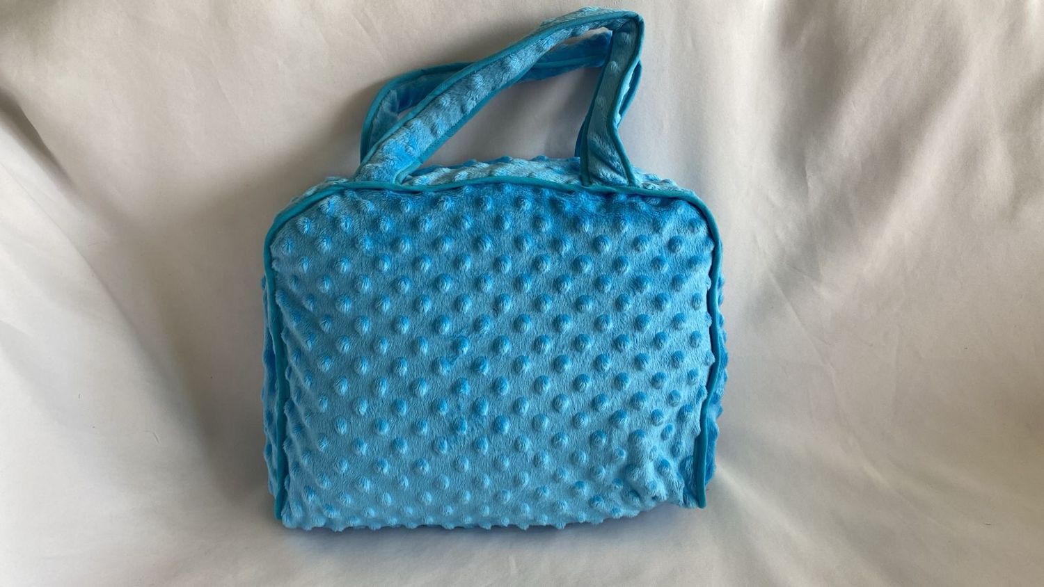 MALETIN EN TELA ESTAMPADA