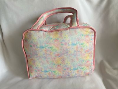 MALETIN EN TELA ESTAMPADA