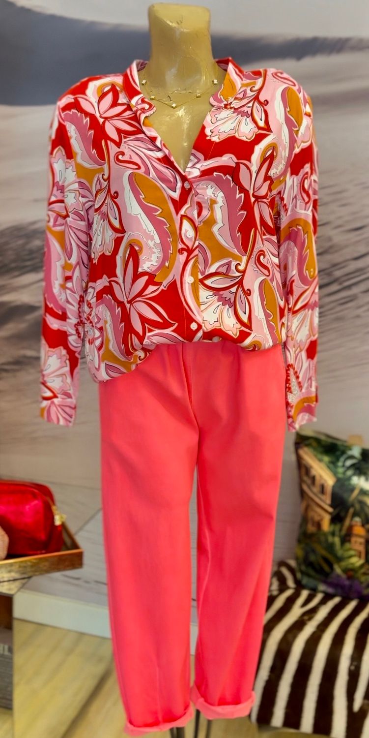 Red Floral Blouse Worn With French Neon Pink Pants With Belt