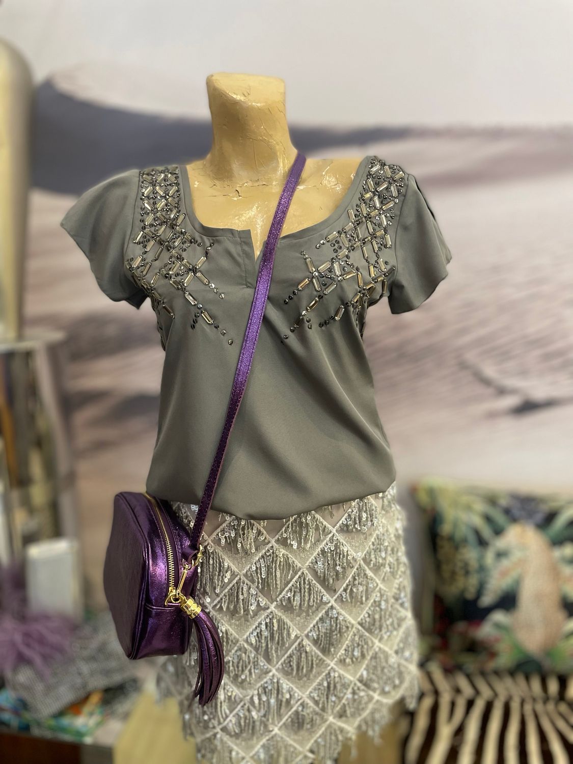 Crystal Incrusted Cap Sleeve Bow Back Top Worn With Metallic Purple Crossover Bag