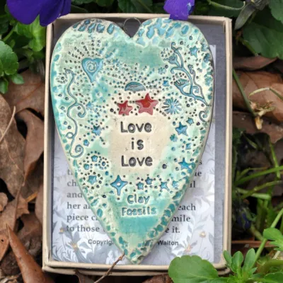Love is Love is.. pottery ornament USA