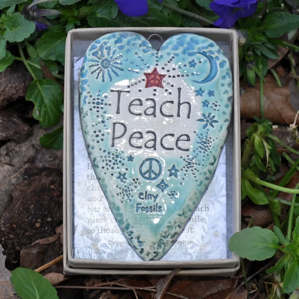 Teach Peace pottery ornament