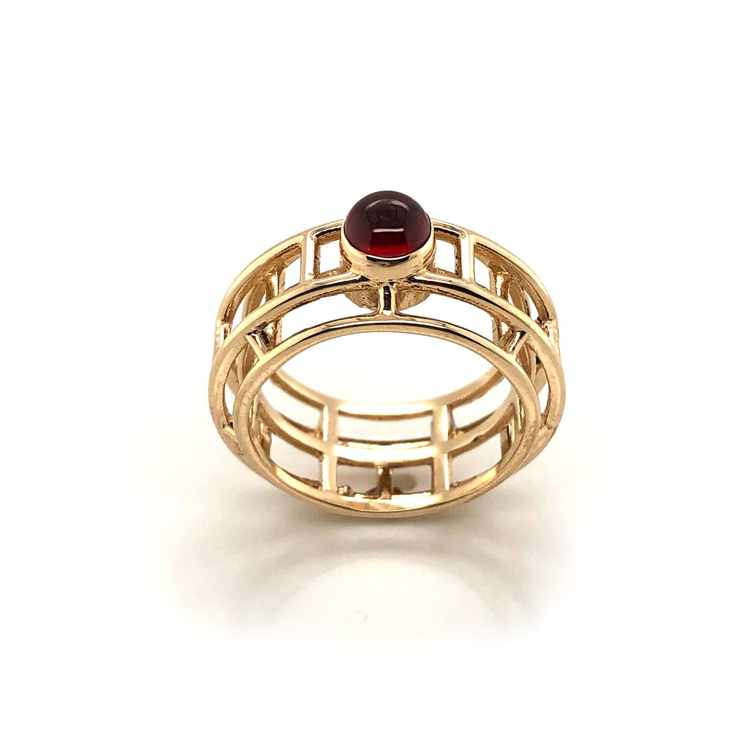 Caged.  14k and garnet ring.