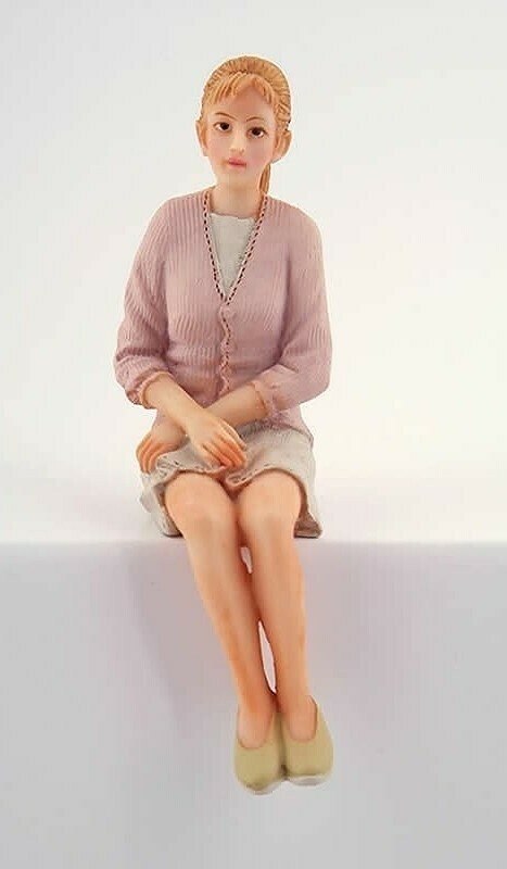 MODERN WOMAN SITTING