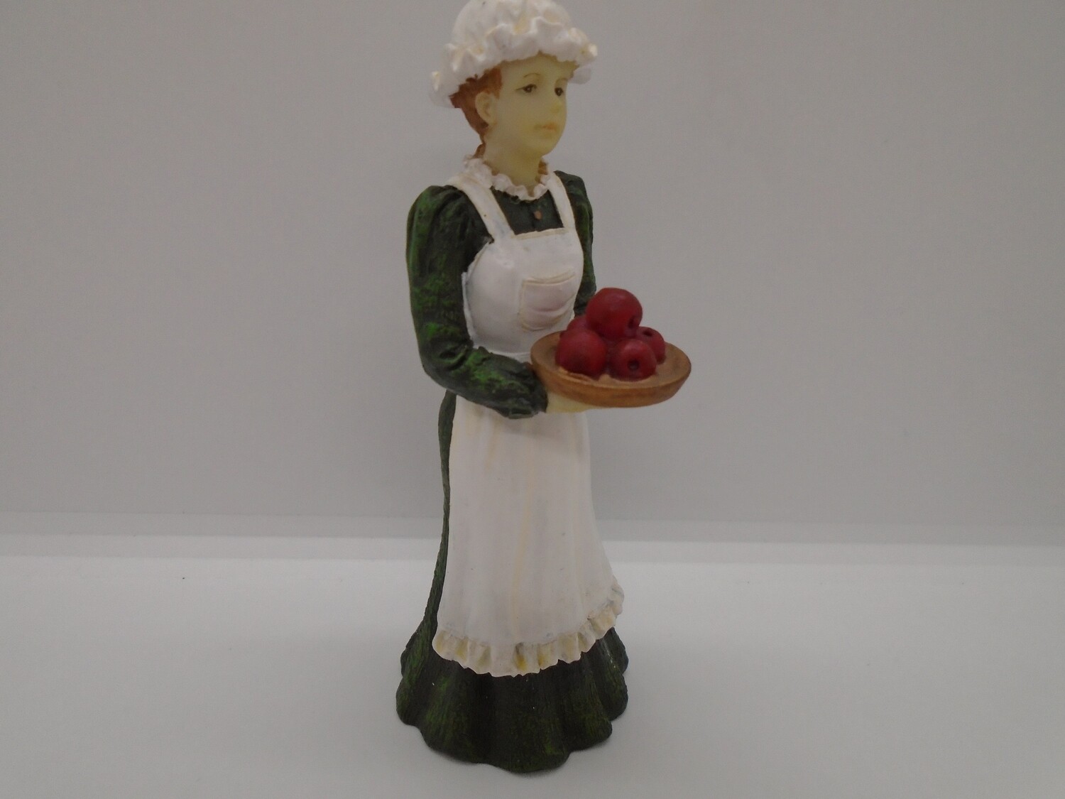 MAID CARRYING APPLES