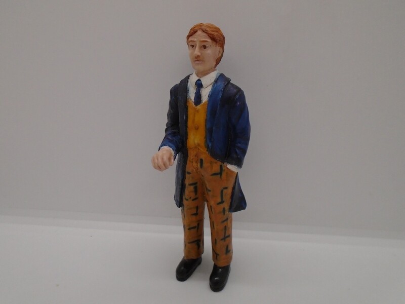 MAN IN LONG TAIL JACKET STANDING