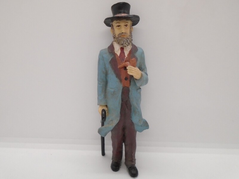 MAN WITH PIPE AND WALKING STICK