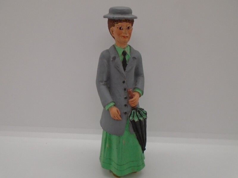 LADY IN GREEN WITH UMBRELLA