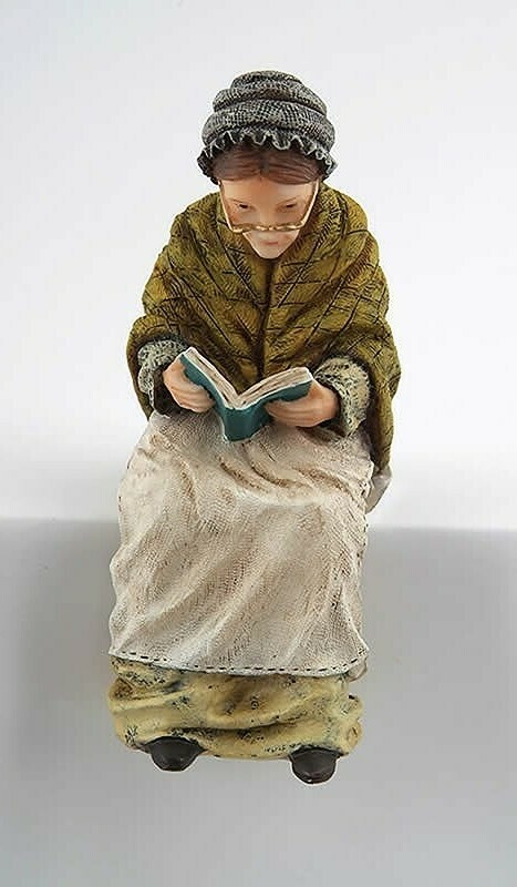 GRANDMA SITTING READING