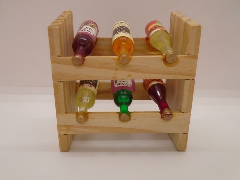 6 BOTTLES OF WINE ON WINE RACK