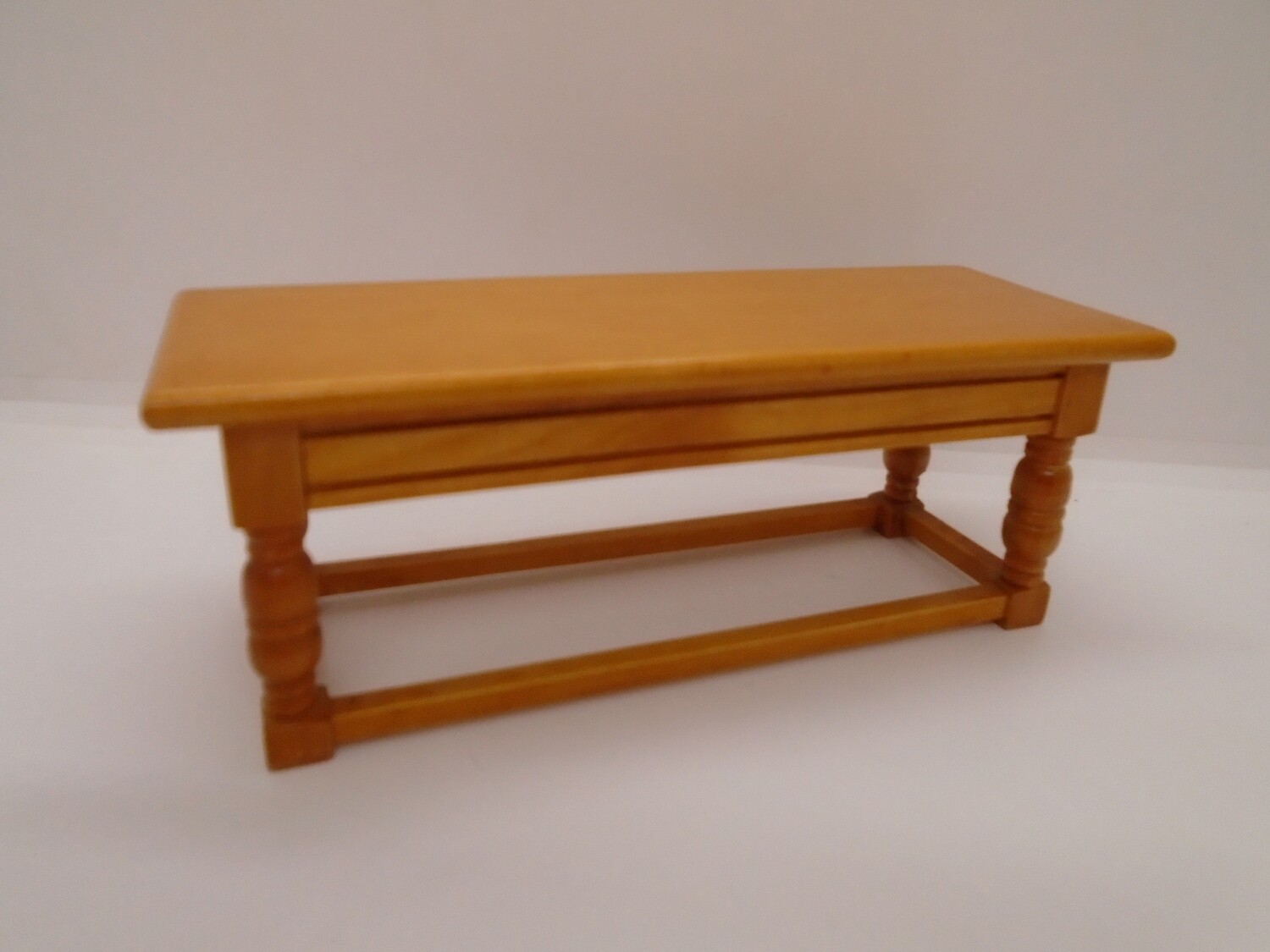 LONG BENCH TABLE IN A DARK VARNISHED PINE COLOUR