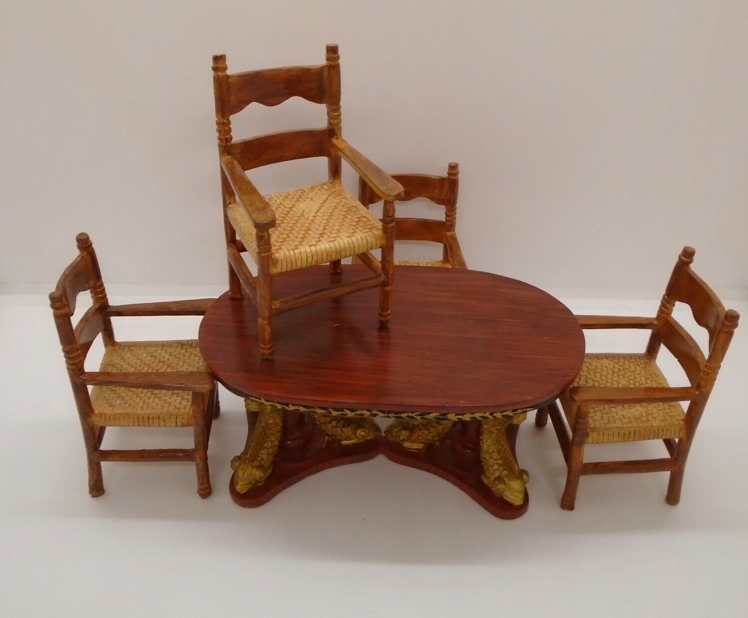 ORNATE TABLE AND 4 CHAIRS IN RESIN