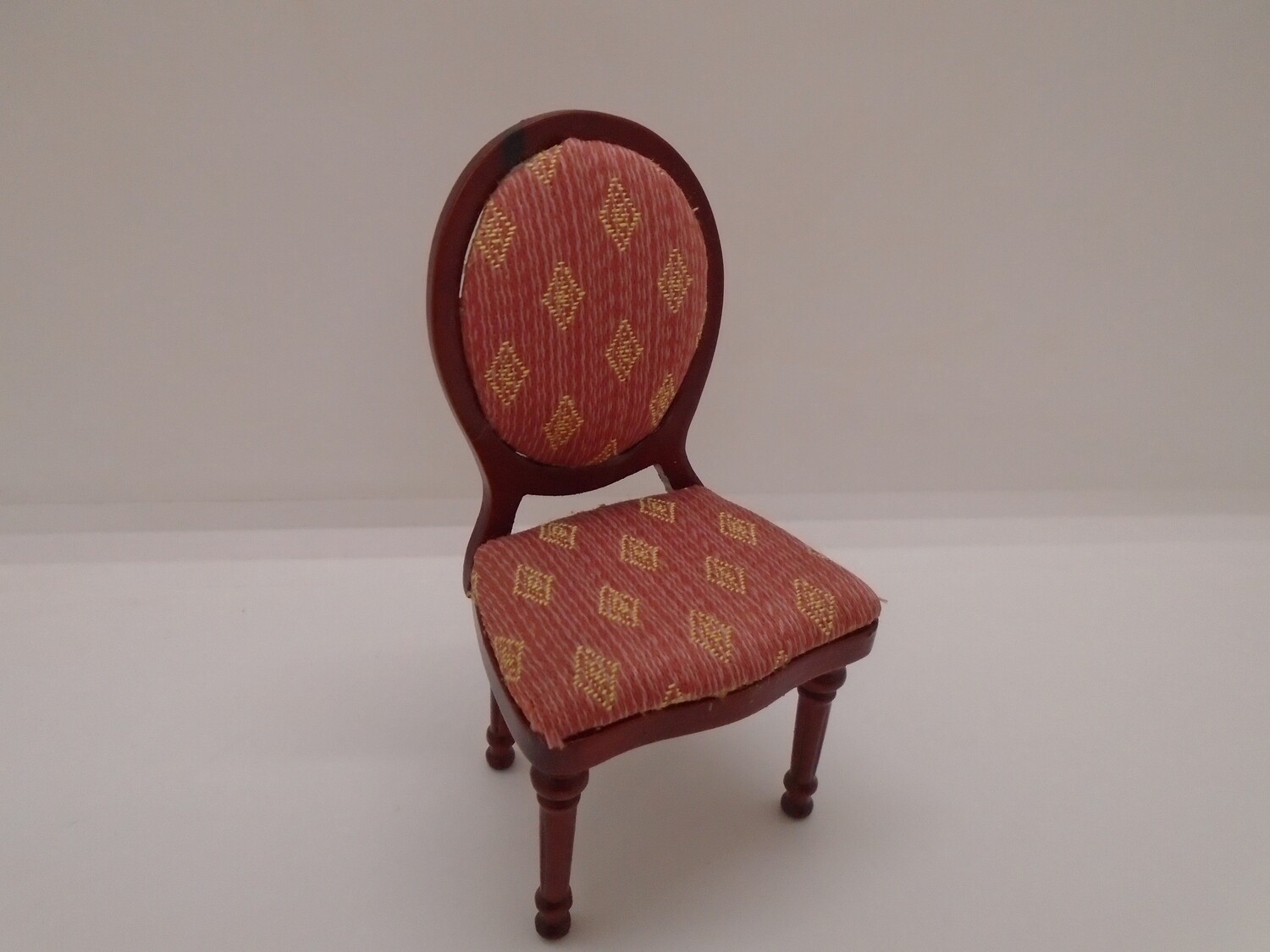 MIRROR BACK FABRIC COVERED CHAIR