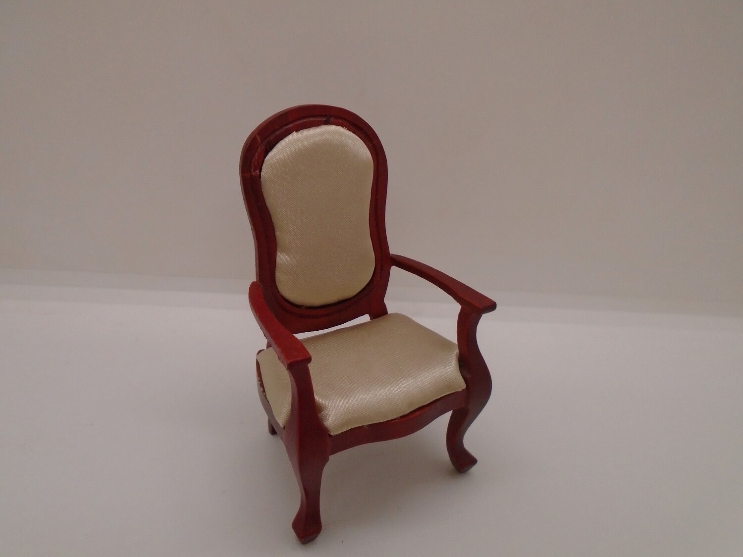 CREAM SATIN COVERED ARMCHAIR