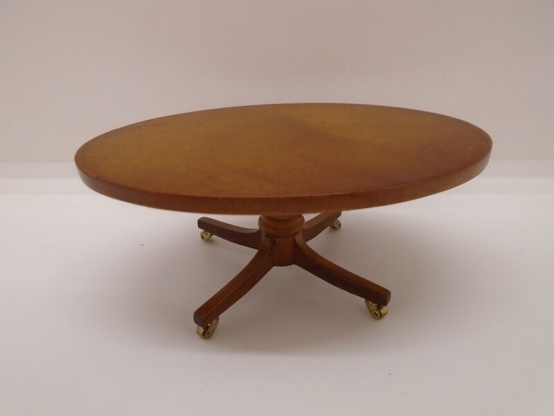 LUTYENS OVAL COFFEE TABLE ON CASTORS