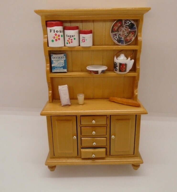 STAGED  DRESSER WITH COOKING INGREDIENTS