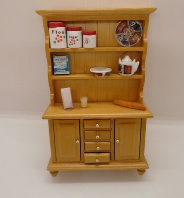STAGED DRESSER WITH COOKING INGREDIENTS