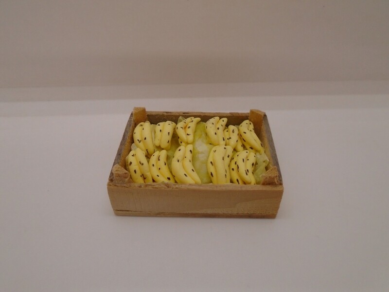 CRATE OF RIPE BANANAS