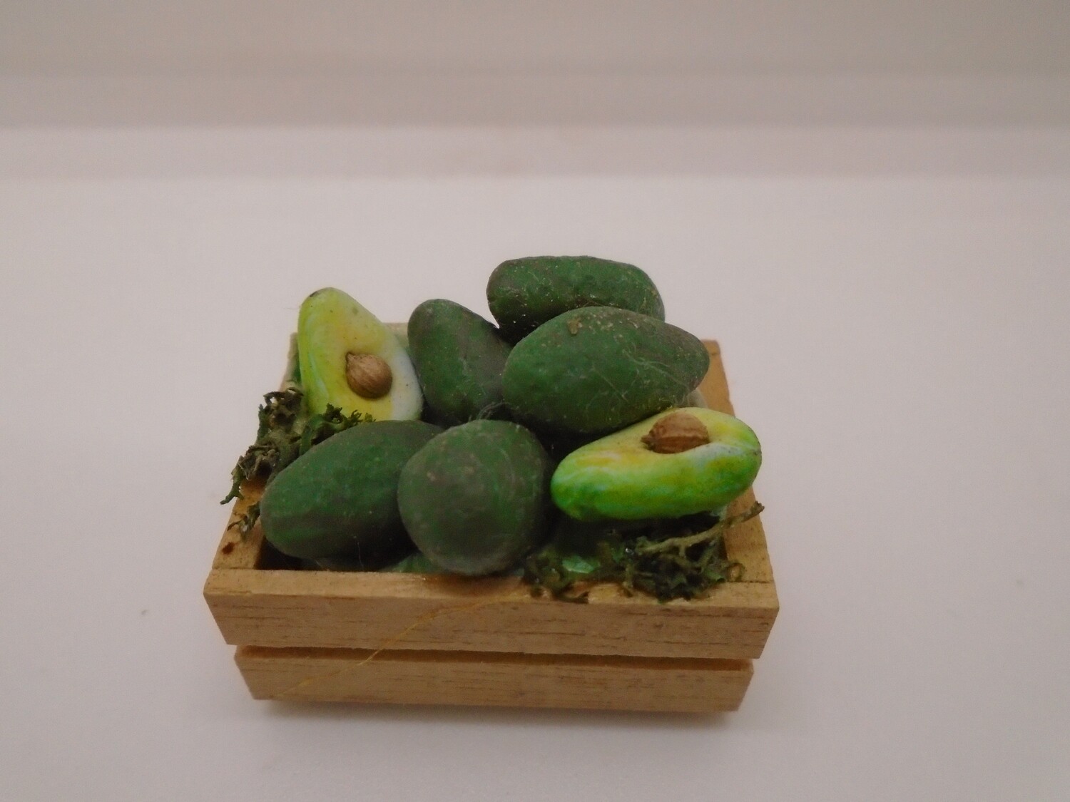 CRATE OF HAND CRAFTED AVOCADOS