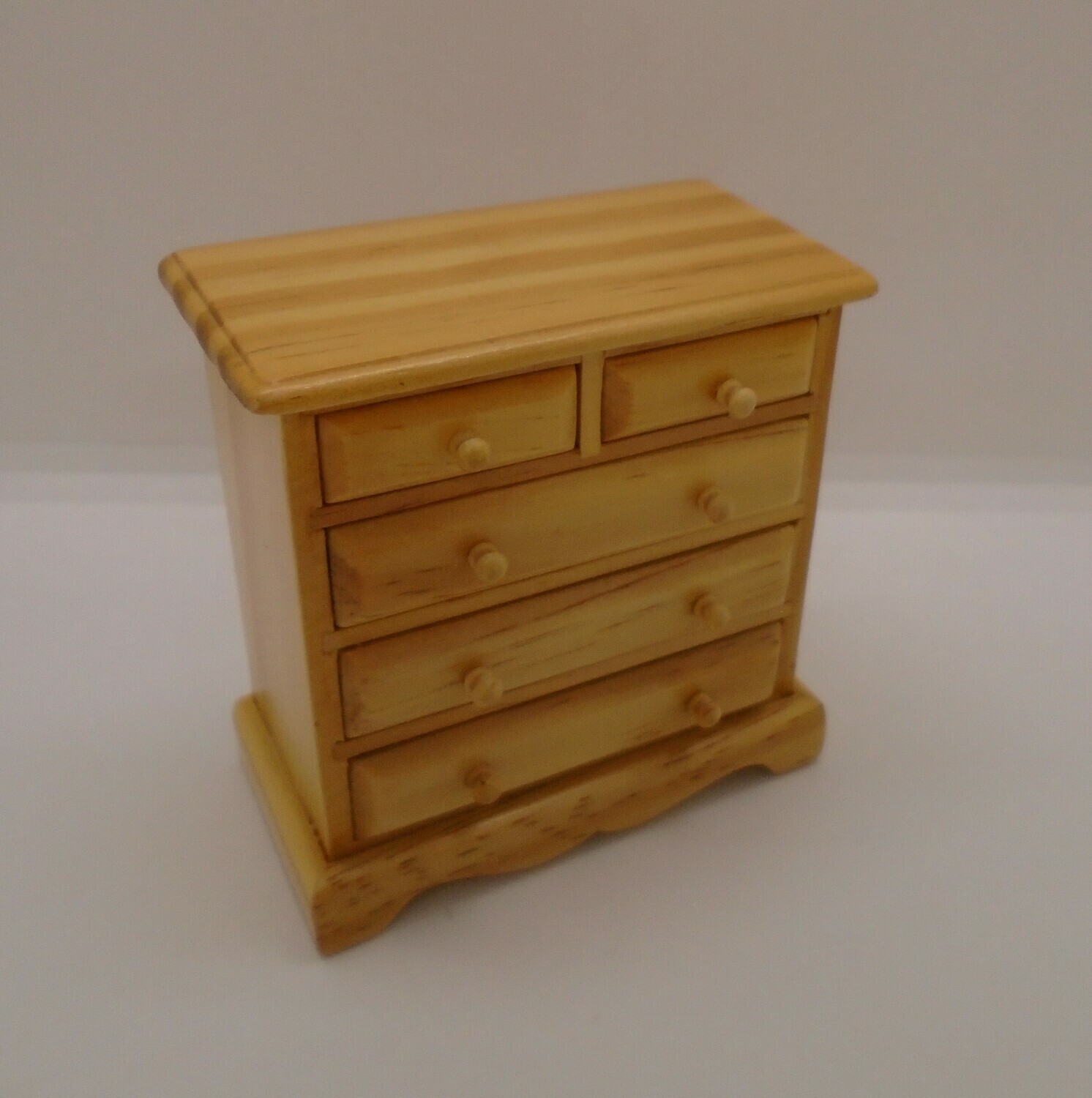5 DRAW CHEST IN LIGHT WOOD