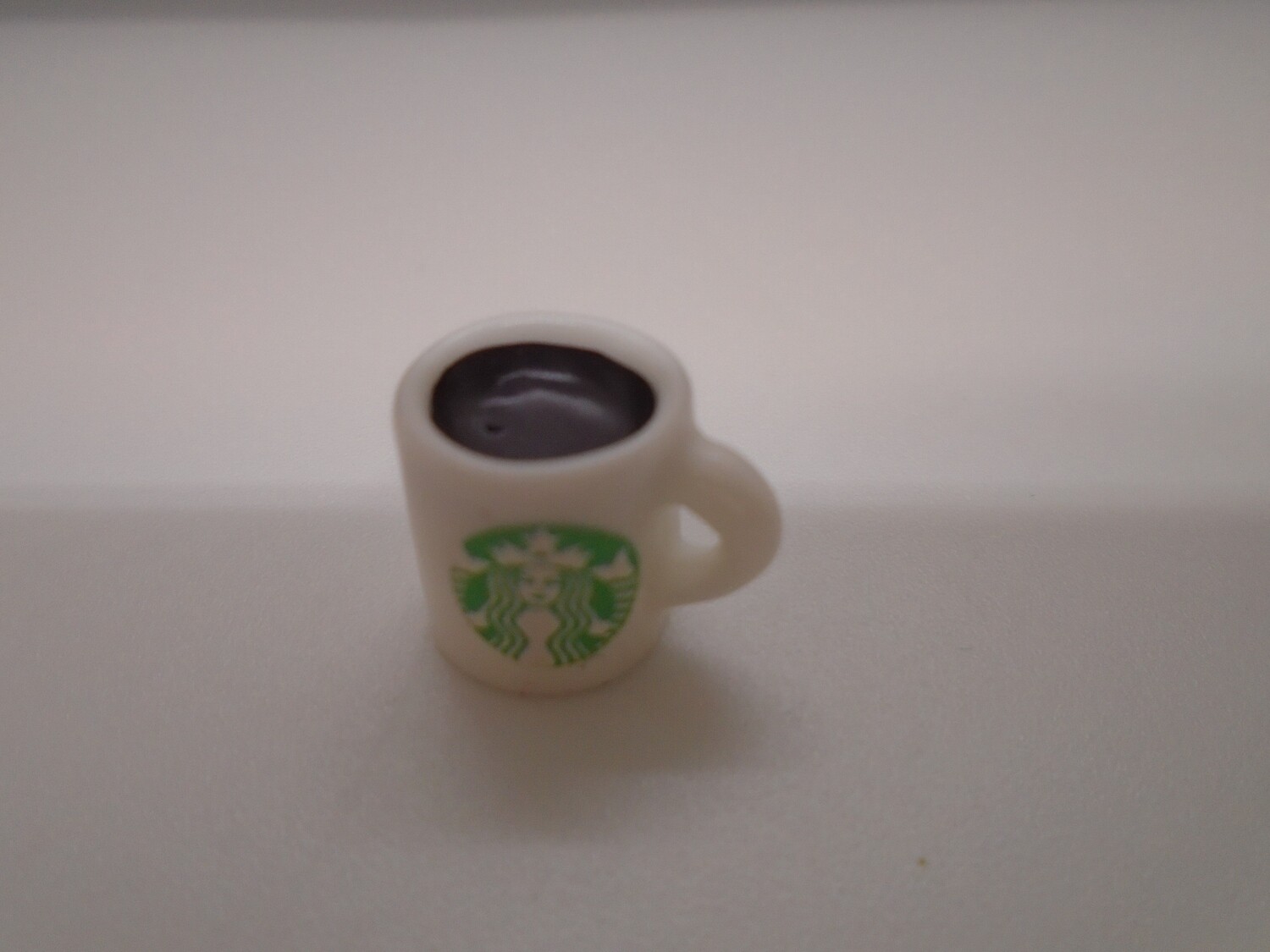 STARBUCKS CHINA MUG WITH COFFEE  IN WHITE