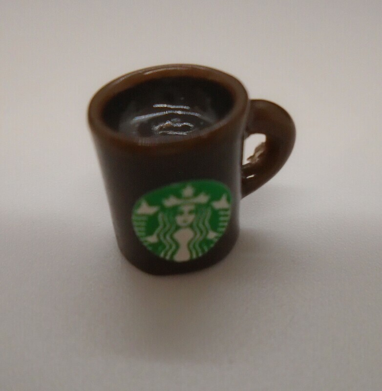 STARBUCKS CHINA MUG WITH COFFEE IN BROWN