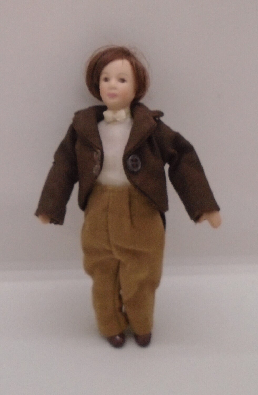 MAN IN BROWN TAILCOAT