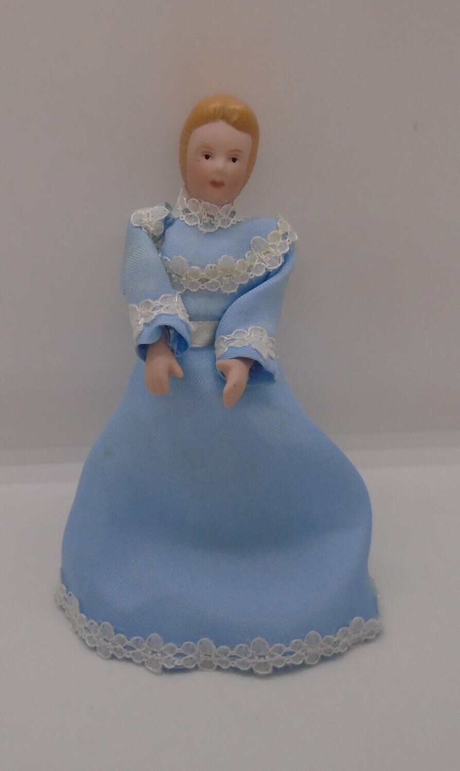LADY IN LIGHT BLUE DRESS