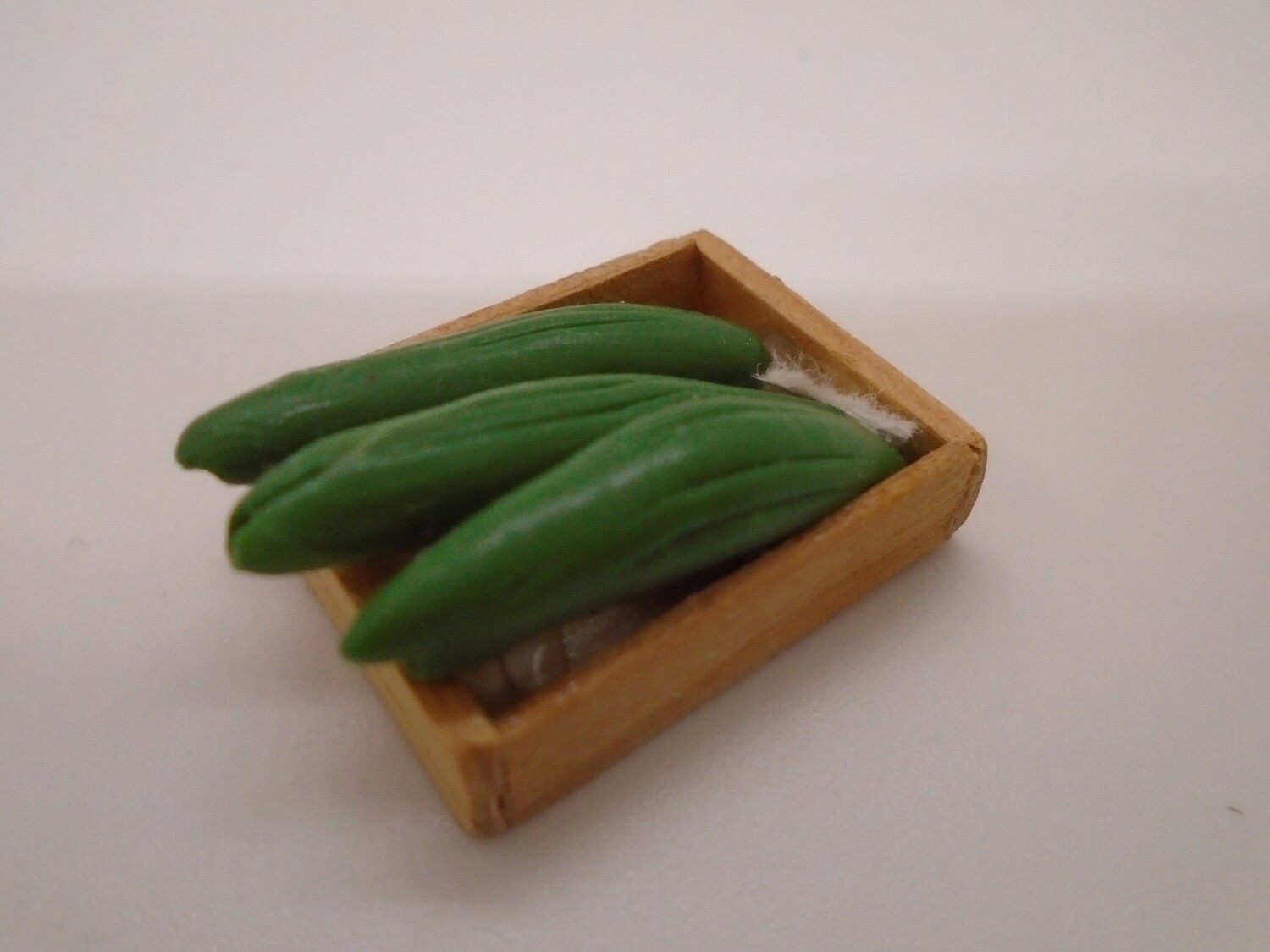 CRATE OF CUCUMBERS