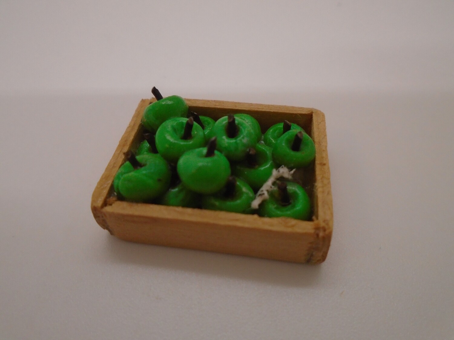 CRATE OF GREEN APPLES