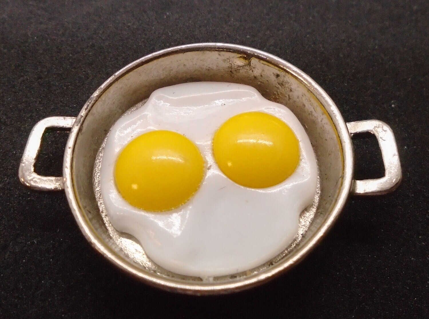 2 EGGS IN LARGE FLAT PAN