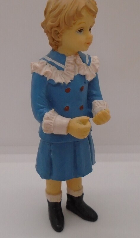 YOUNG GIRL IN BLUE SKIRT AND JACKET