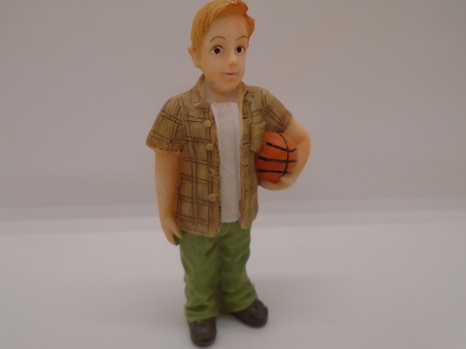 MODERN YOUNG BOY WITH BALL MODERN YOUNG BOY WITH BALL