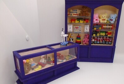 DRESSEED TOY SHOP CABINET AND COUNTER INCLUDING TOYS