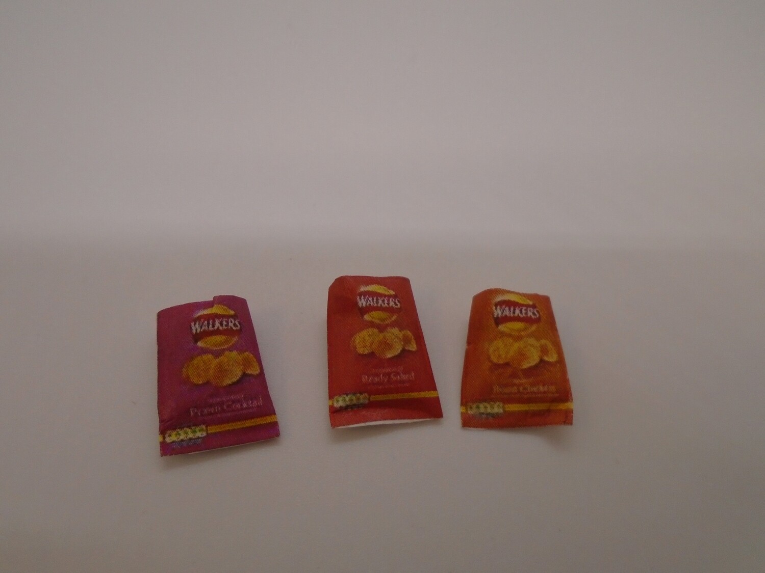 PACKET OF OPEN CRISPS WITH CONTENTS