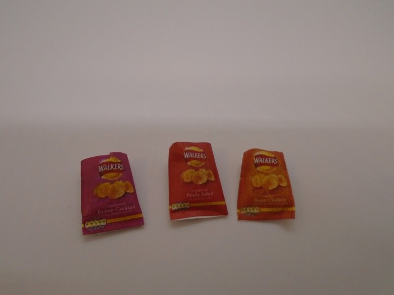 PACKET OF OPEN CRISPS WITH CONTENTS