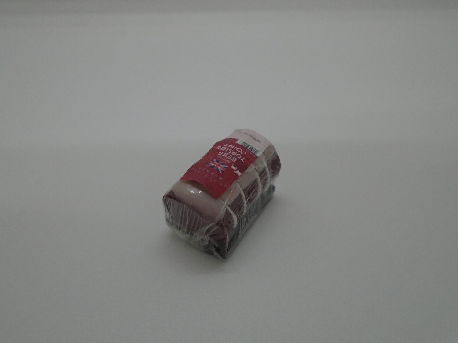 ROLLED RAW BEEF JOINT IN PACKAGING