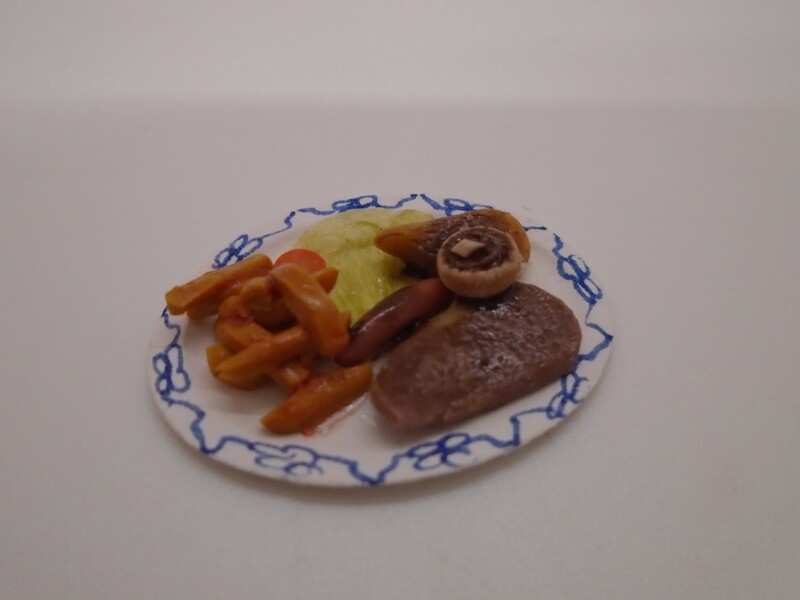 STEAK, CHIPS MUSHROOM AND SALAD MEAL