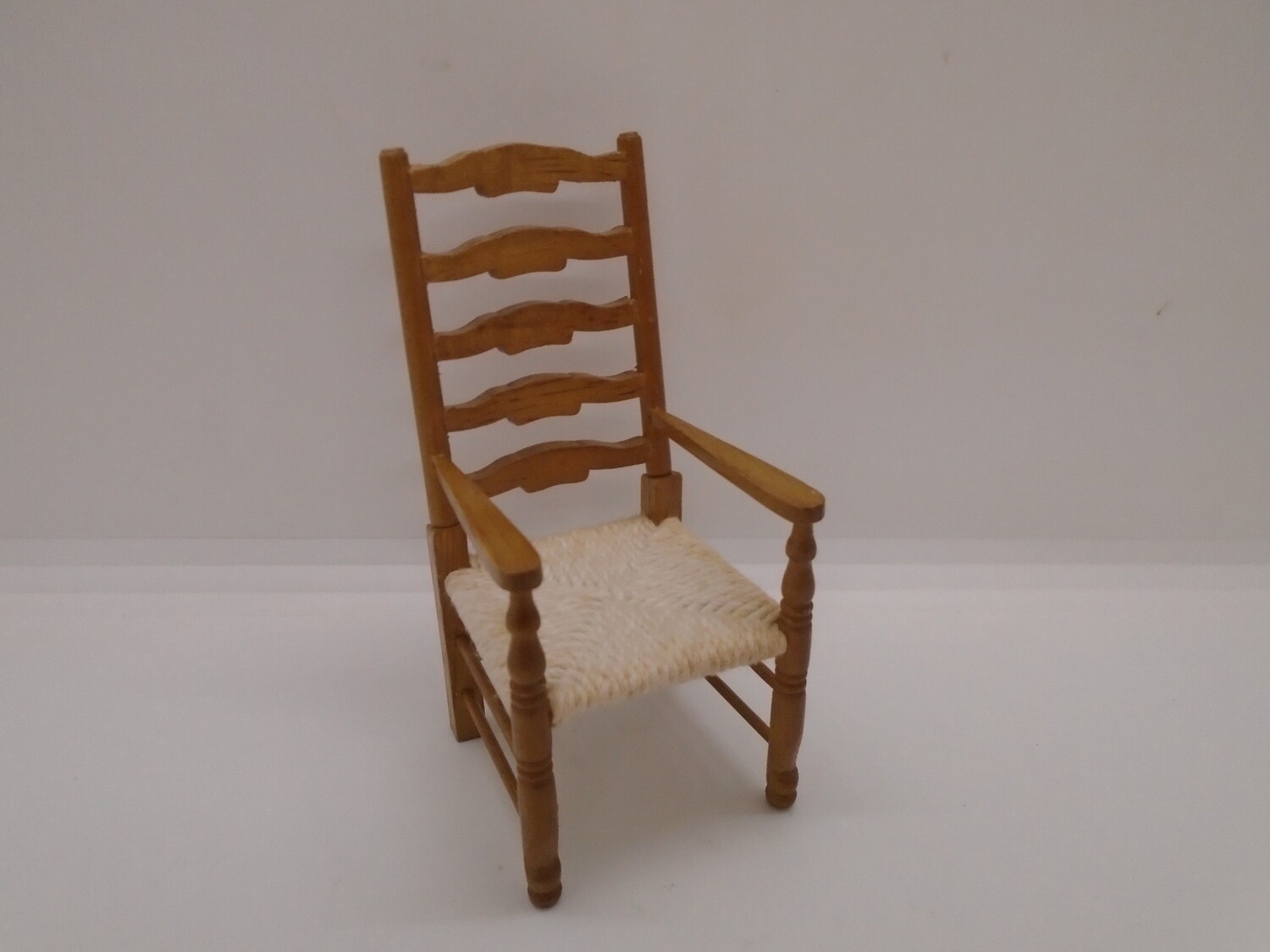 STRING SEATED LADDER BACK CHAIR WITH ARMS