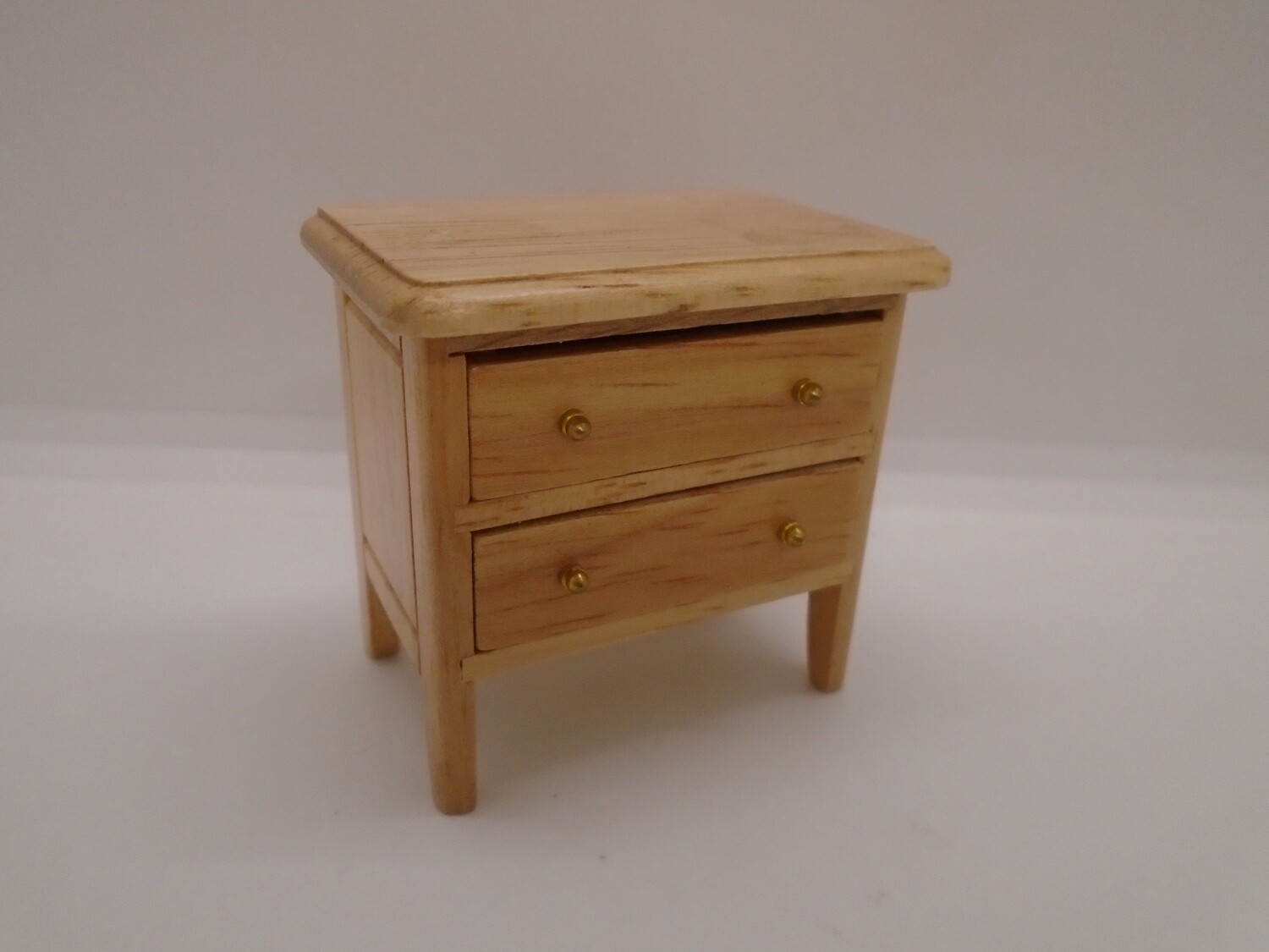2 DRAWER CABINET IN LIGHTWOOD