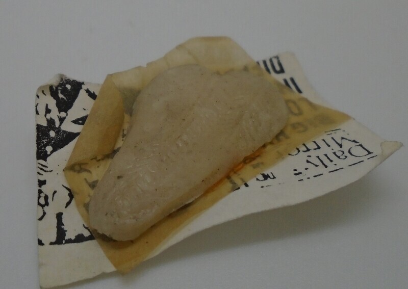 LARGE FRESH FISH IN NEWSPAPER