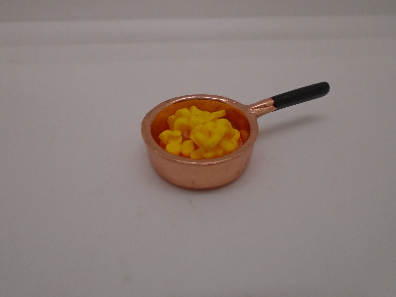 COPPER SAUCEPAN OF SCRAMBLED EGG