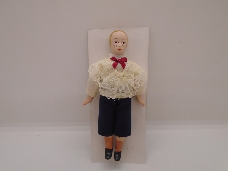 BOY IN FRILLY TOP