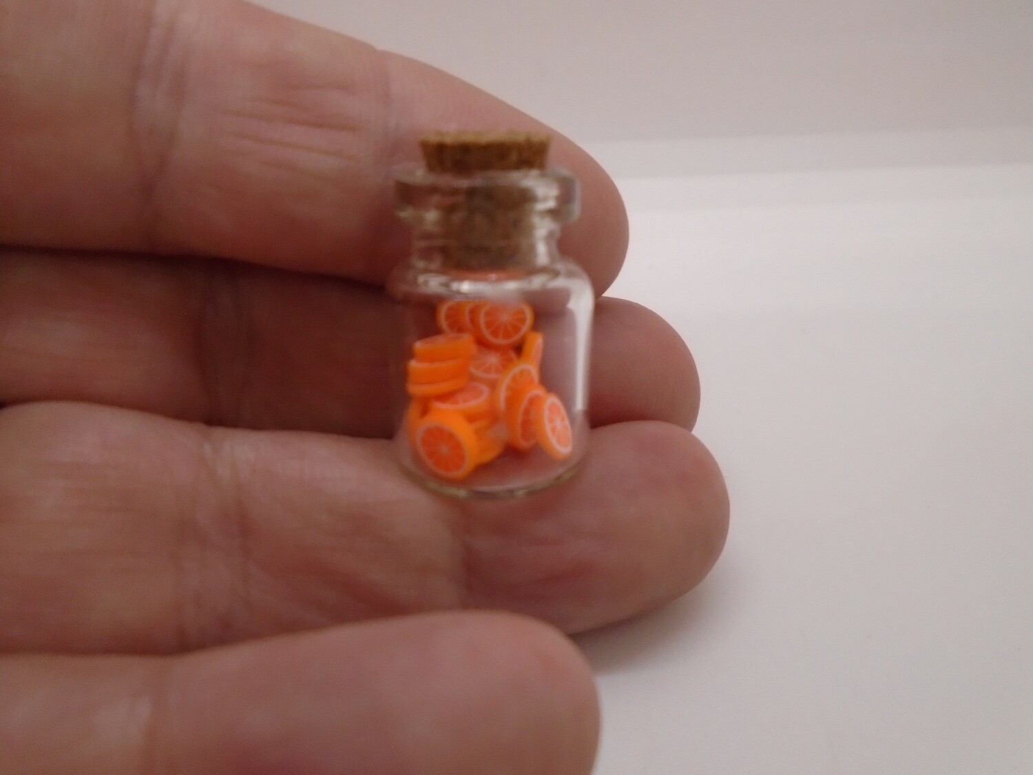 JAR WITH LID OF ORANGE SLICES