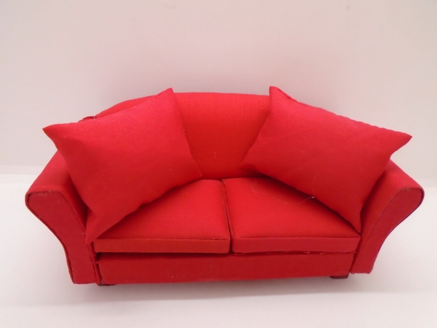 RED SOFA WITH CUSHIONS