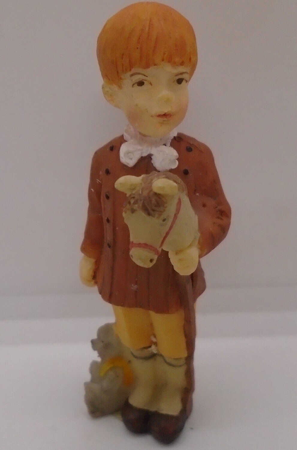 BOY WITH HOBBY HORSE