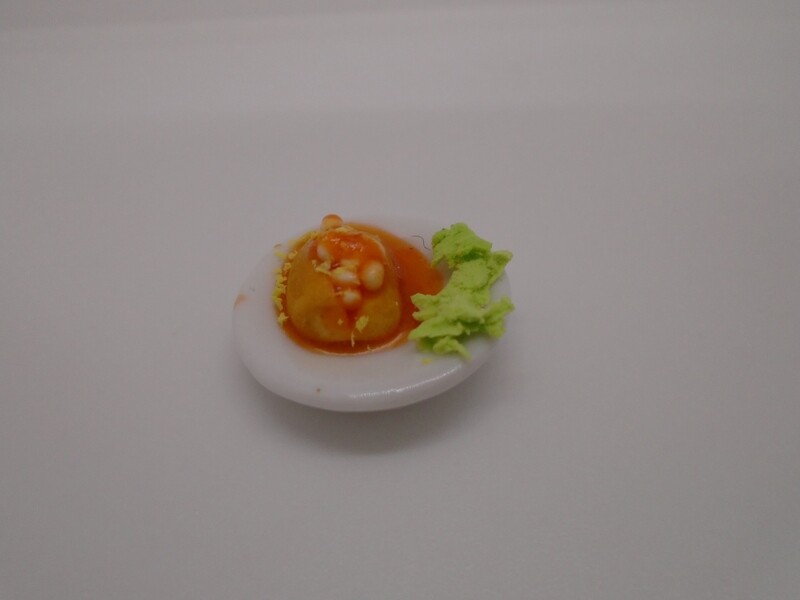 JACKET POTATO WITH CHEESE AND BEANS ON CHINA PLATE