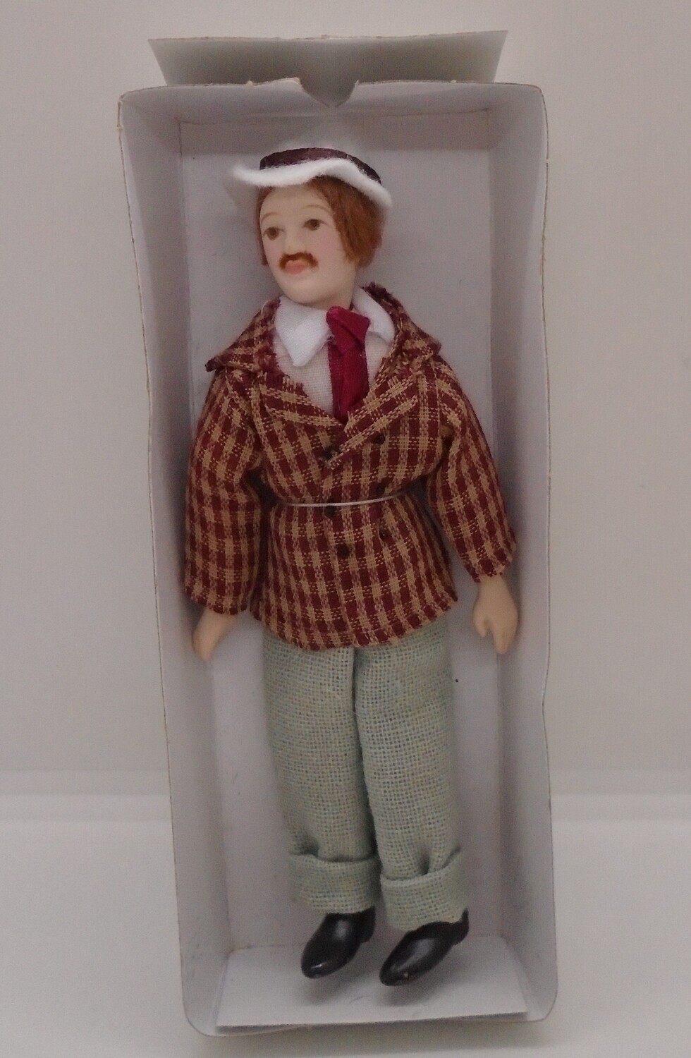 HAND CRAFTED PORCELAIN MAN IN BOX