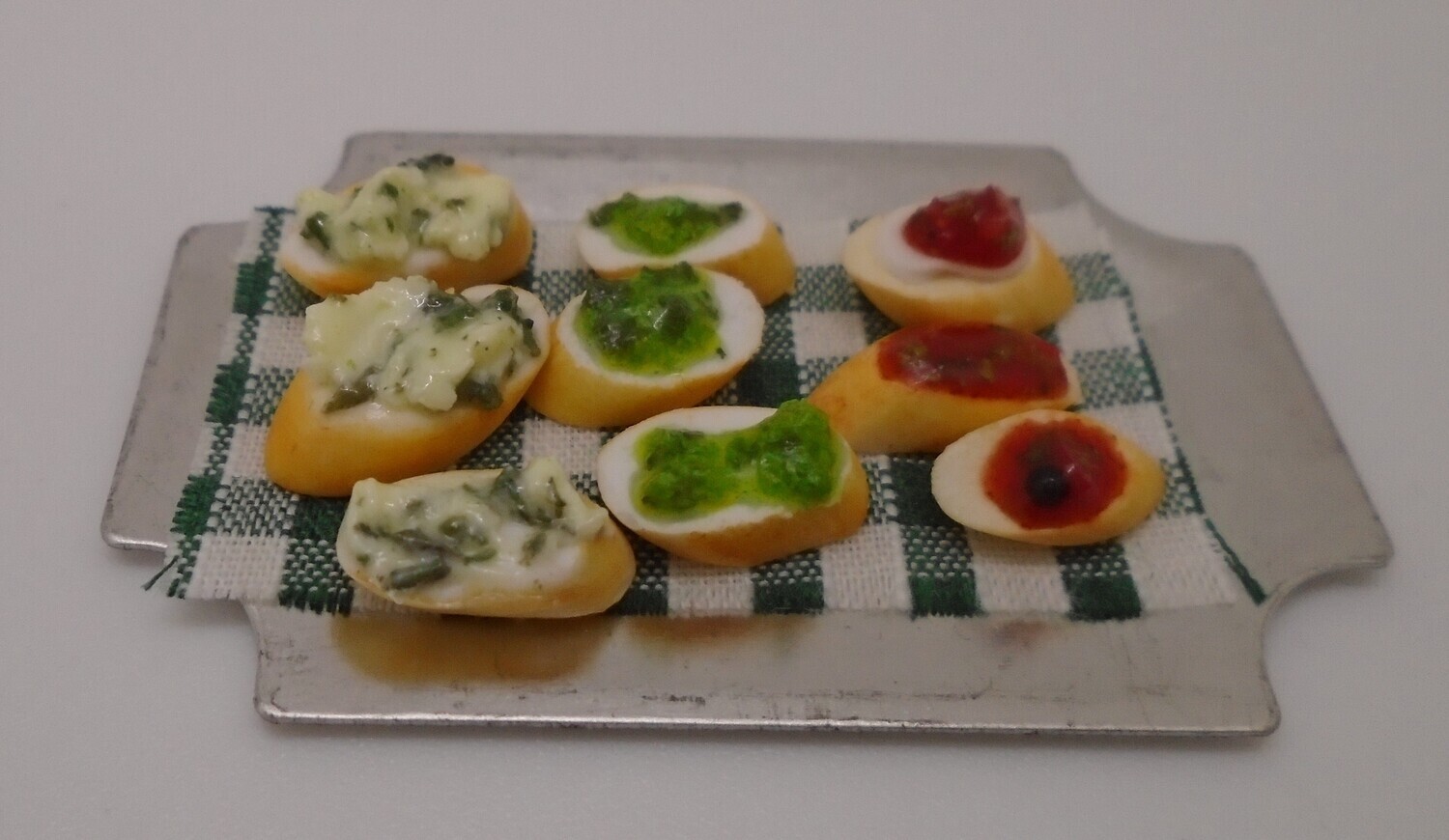 PLATTER OF TOPPED BREADS